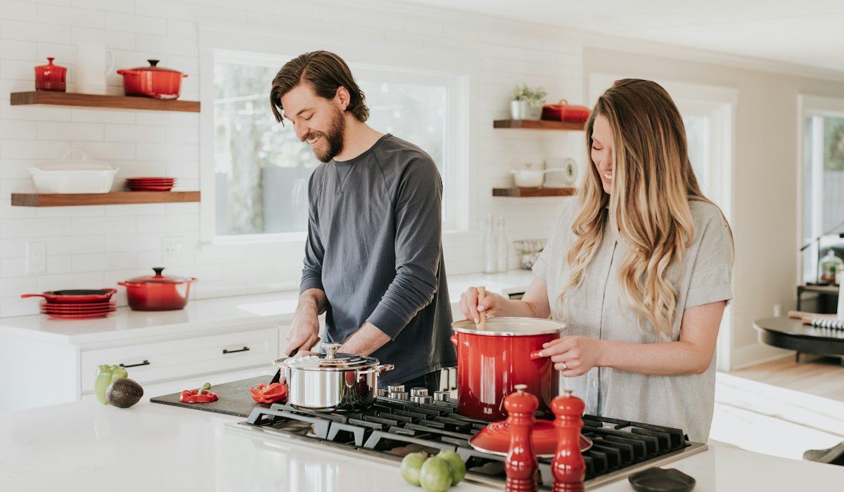 Role play ideas for couples at home cooking together in the kitchen