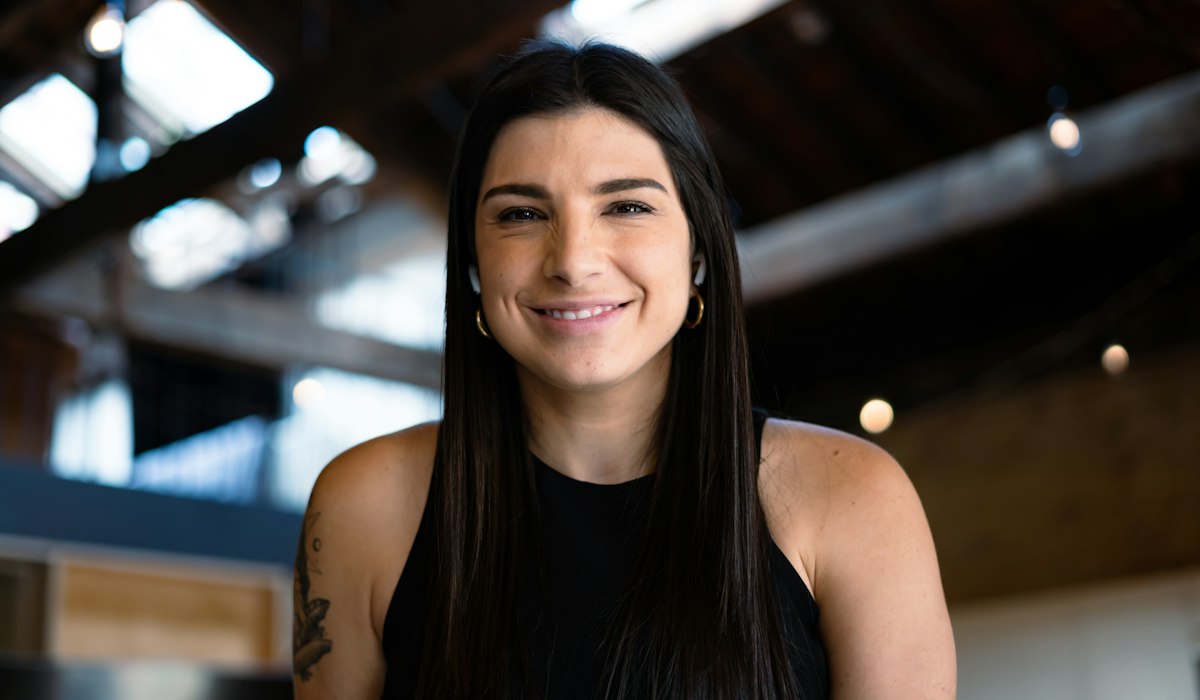 Confident woman smiling with smooth pick up lines for him