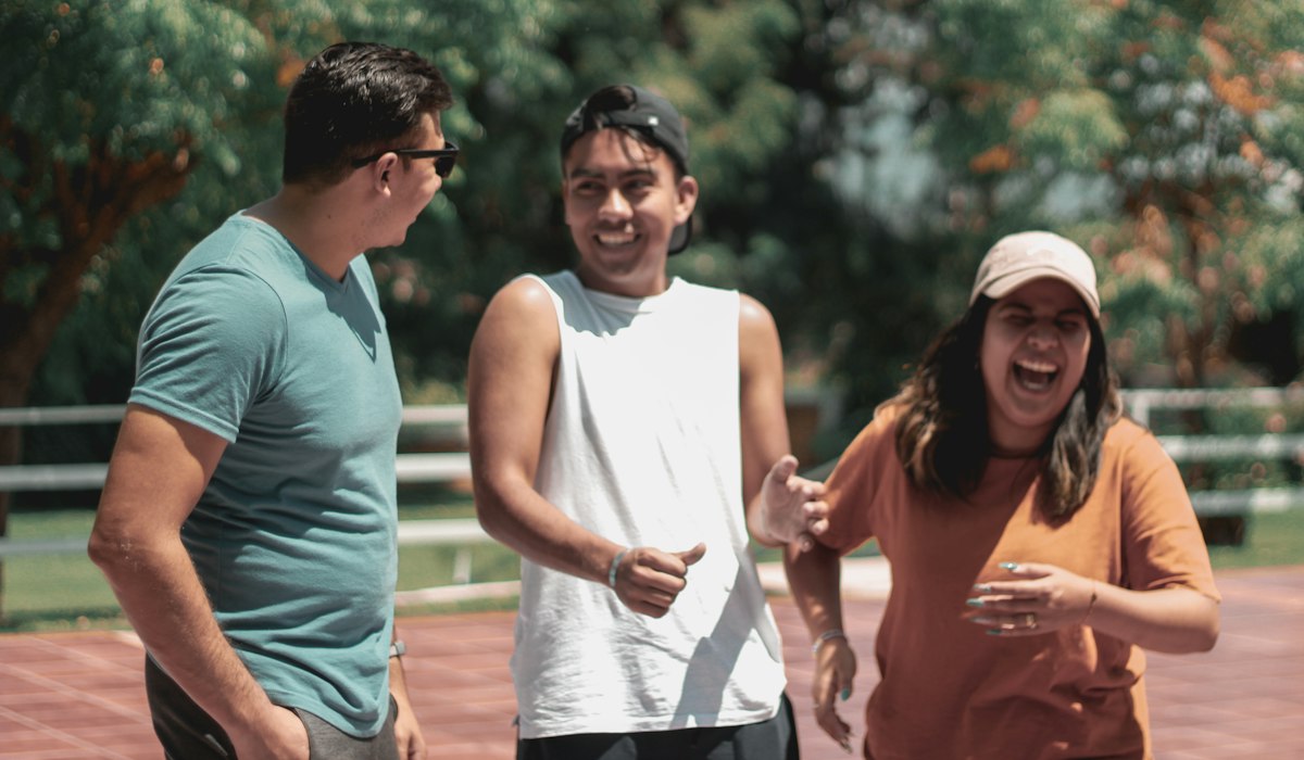 Thanksgiving party games for large groups friends laughing together